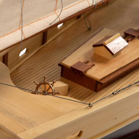 Image of Close view of the bow of the Authentic Models Painted Bluenose II Scale Model Sailing Ship AS138