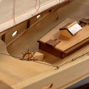 Close view of the bow of the Authentic Models Painted Bluenose II Scale Model Sailing Ship AS138