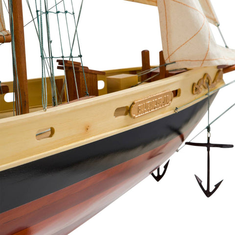 Image of Close left rear view of bow of the Authentic Models Painted Bluenose II Scale Model Sailing Ship AS138